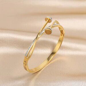 Elegant Gold Bracelet with Silver Accents